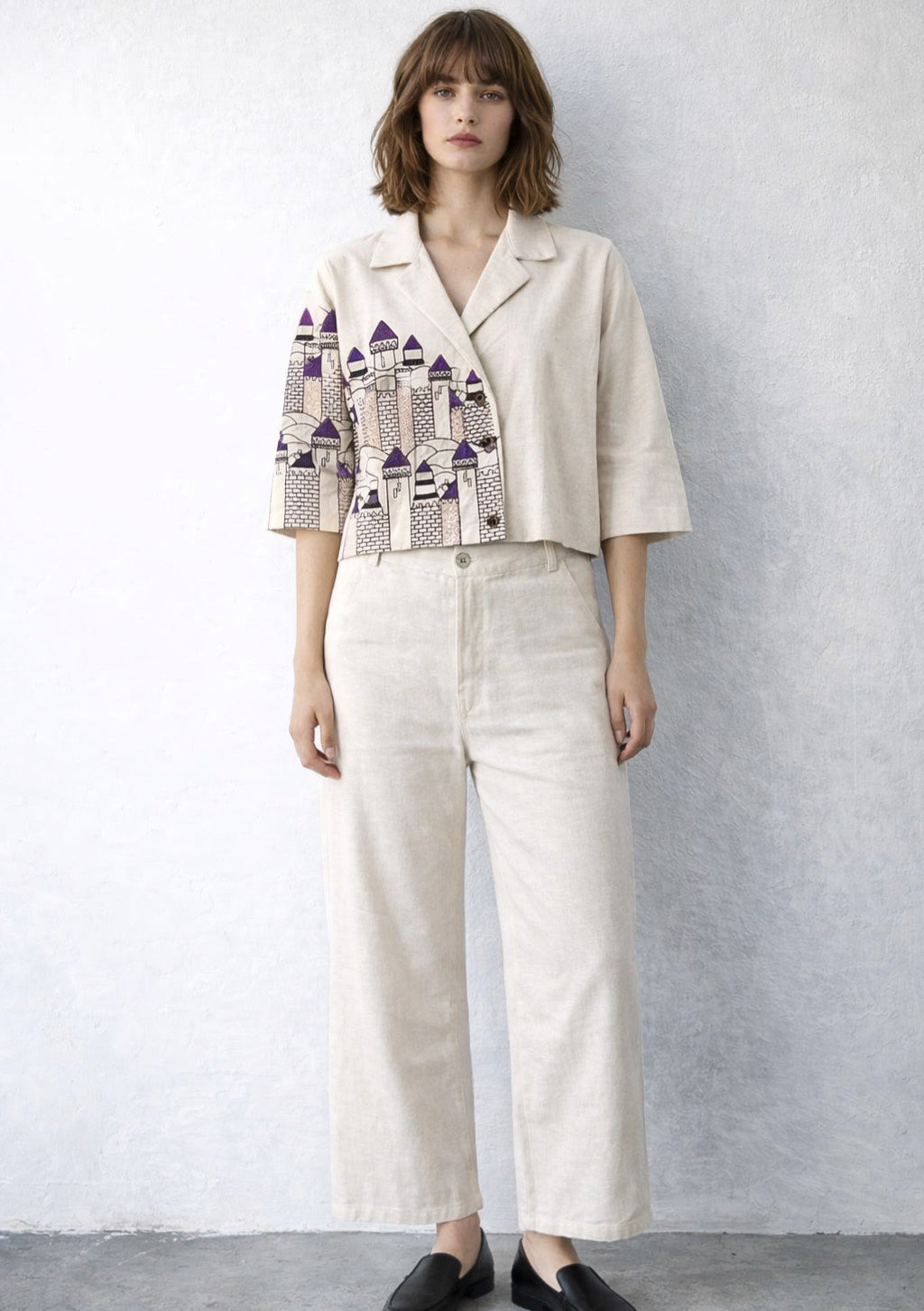 Montx women's linen embroidered co-ord set in ivory and purple, featuring intricate designs and matching top and pants.