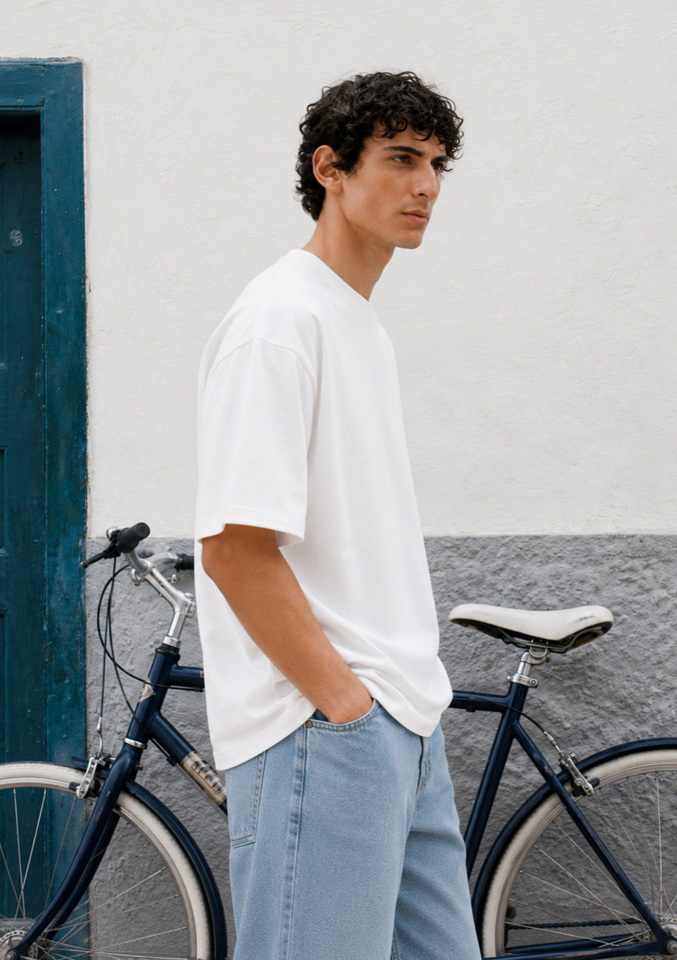 Montx Essential Boxy Fit T-Shirt for Men in white, showcasing a casual, relaxed fit, made from soft, breathable fabric.