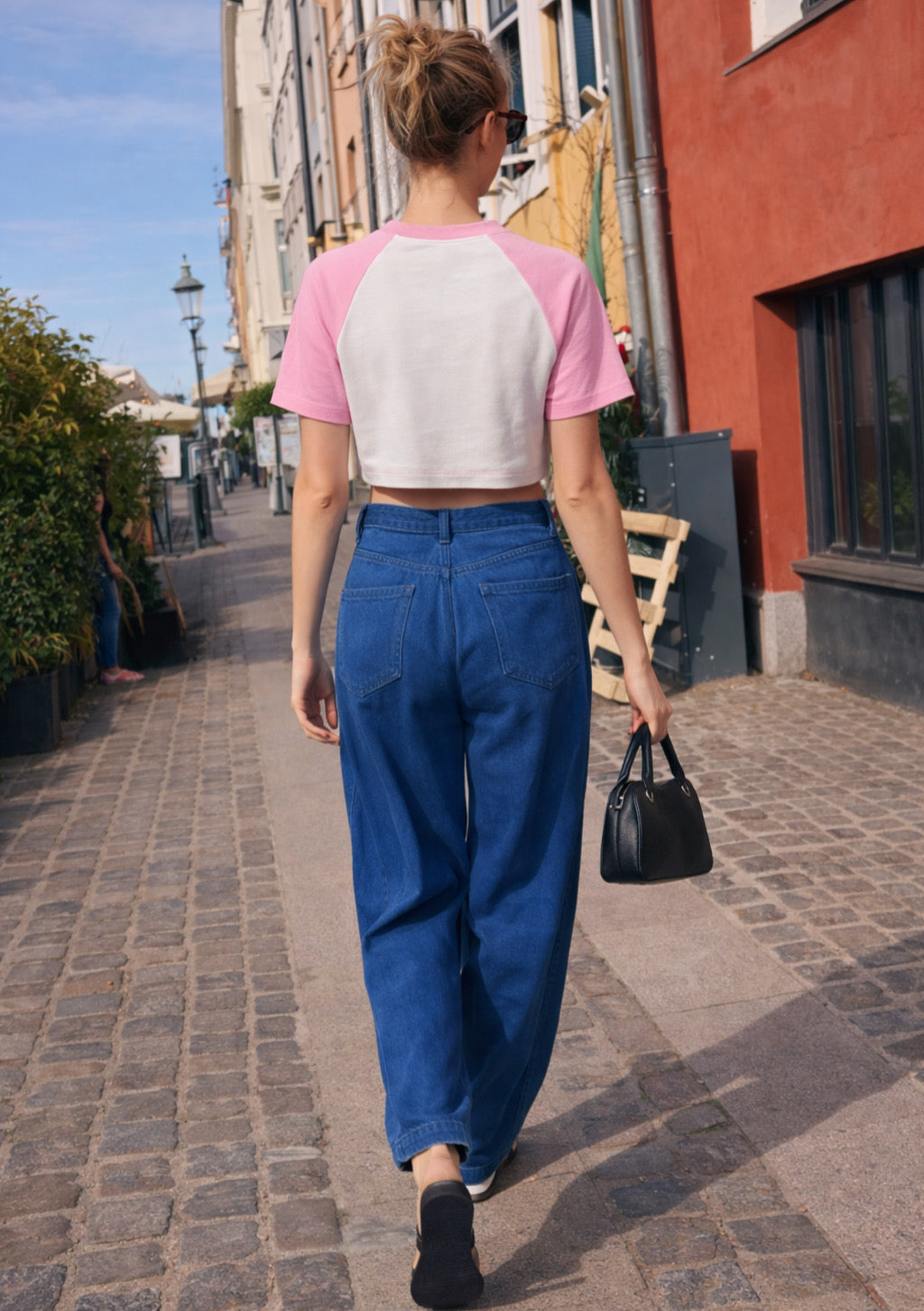 Montx women's pink and white crop t-shirt with a stretch fit, casual style, and soft fabric.