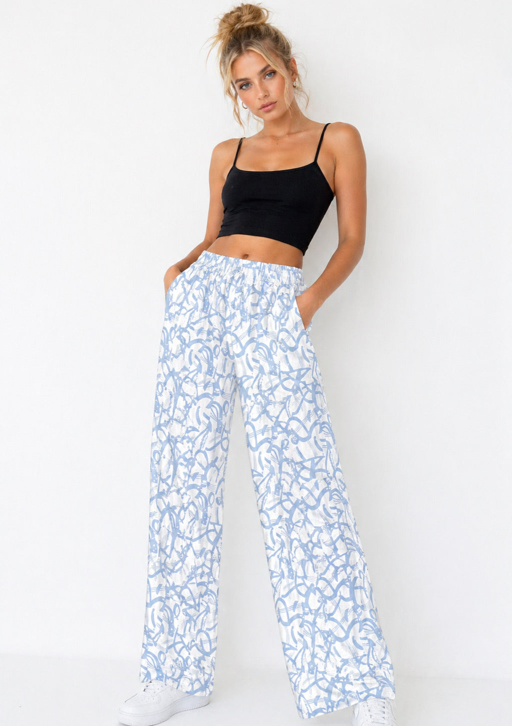 Montx Women’s sky blue abstract print wide leg joggers with relaxed fit, soft fabric, and comfortable waistband.