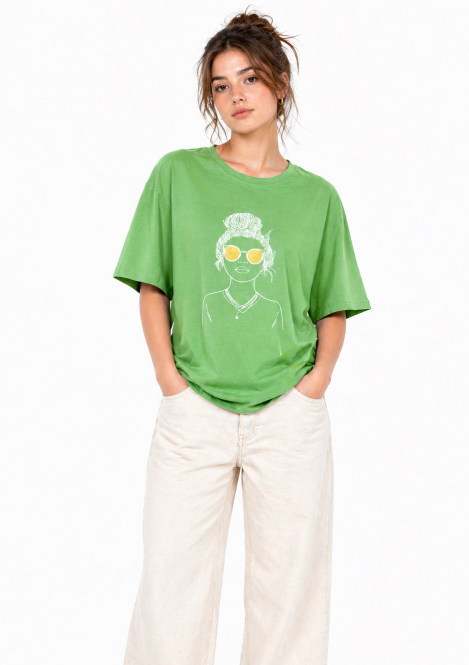 Montx Women's green graphic oversized T-shirt with bold design, casual fit, and soft fabric for comfortable everyday wear.
