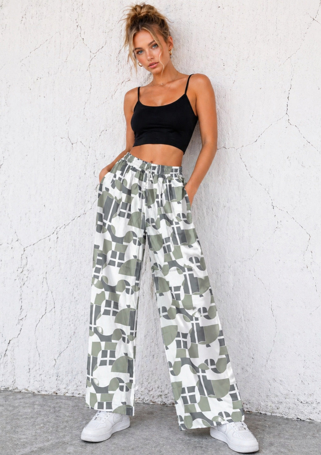 Women’s olive green abstract print wide leg joggers by Montx The Clothing Brand, relaxed fit with comfortable wide legs.