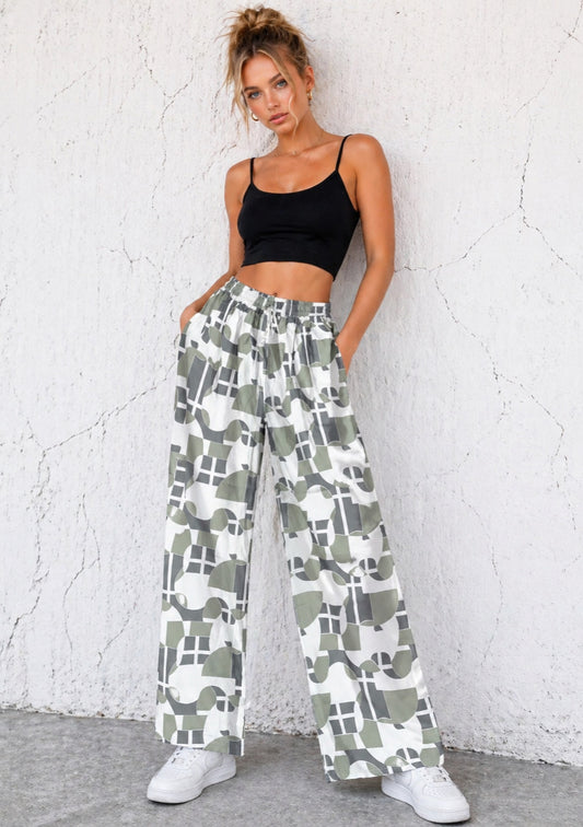 Women’s olive green abstract print wide leg joggers by Montx The Clothing Brand, relaxed fit with comfortable wide legs.
