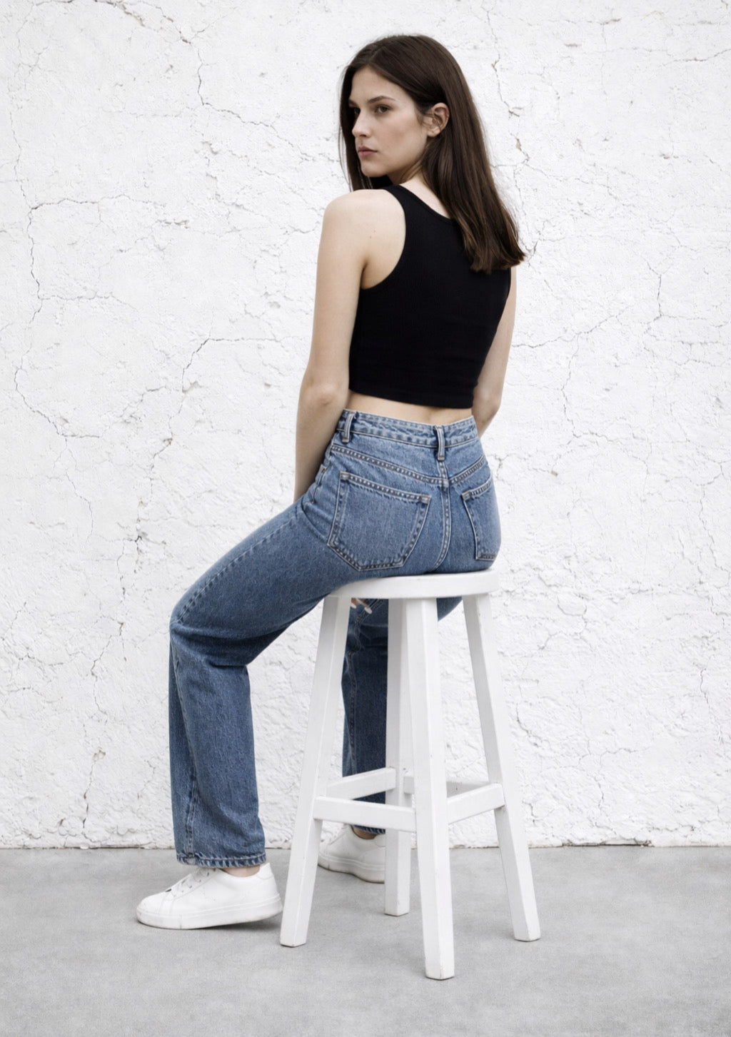 Montx mid wash blue denim jeans with straight fit, showing front view with classic five-pocket design and belt loops.