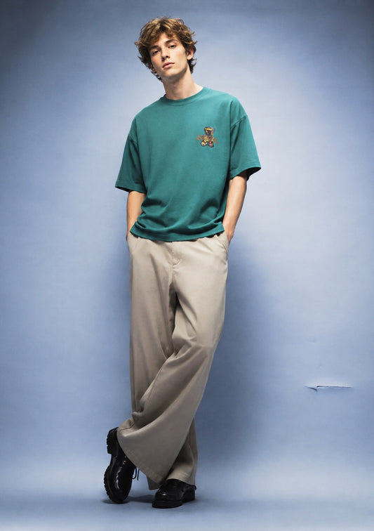 Montx men's loose fit street style T-shirt featuring a polar bear design in sea green color.