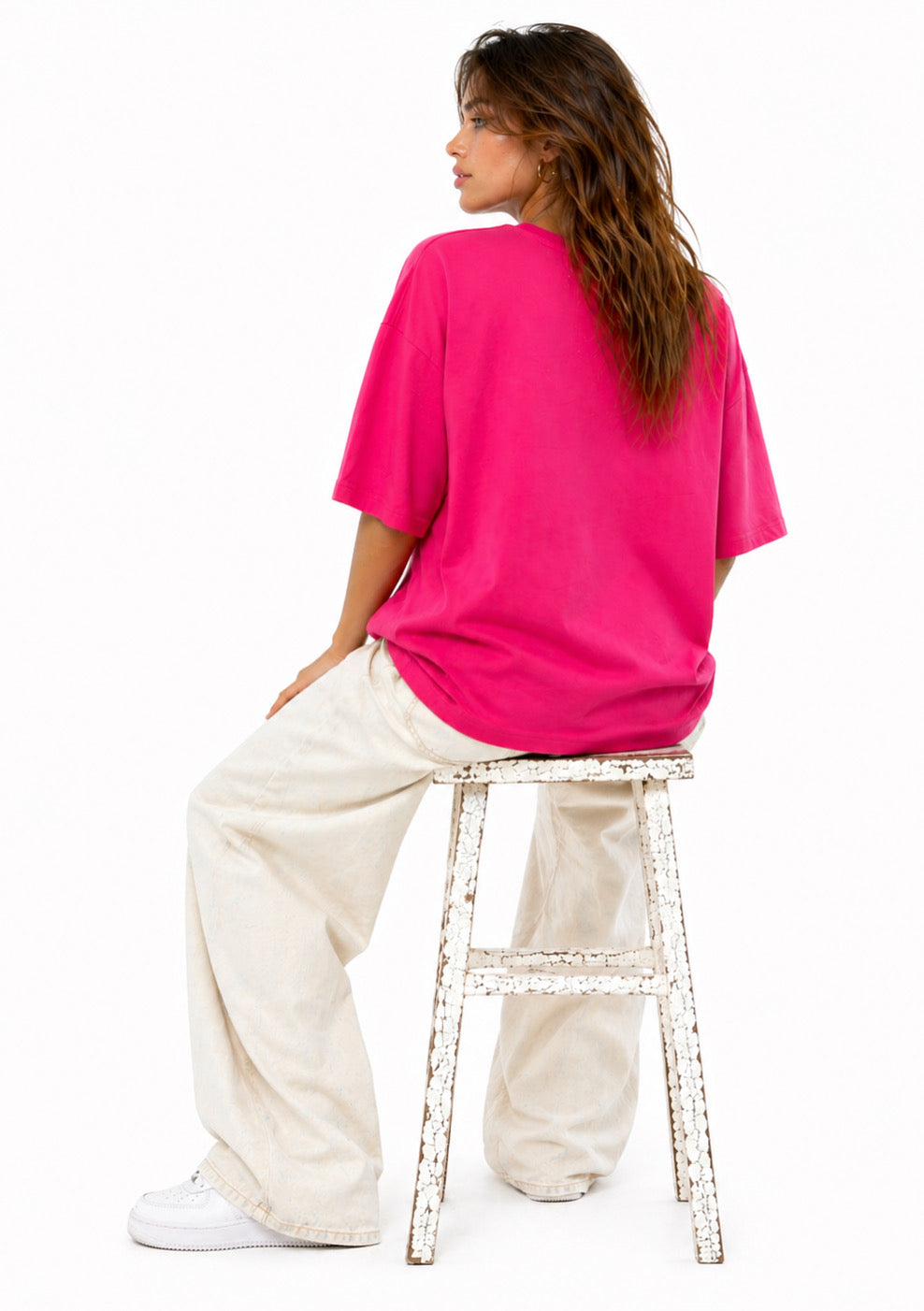 Women’s hot pink oversized plus size cotton T-shirt by Montx The Clothing Brand, displayed on a hanger.