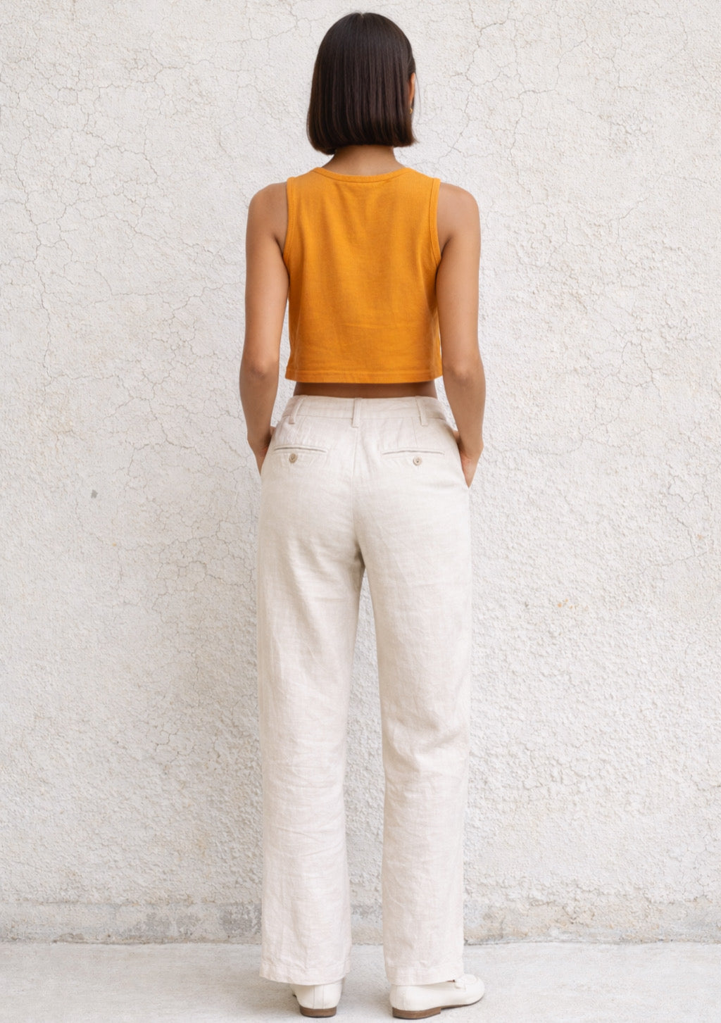 Montx women's orange sleeveless crop top with slim fit, lightweight fabric and stylish design perfect for casual summer wear.