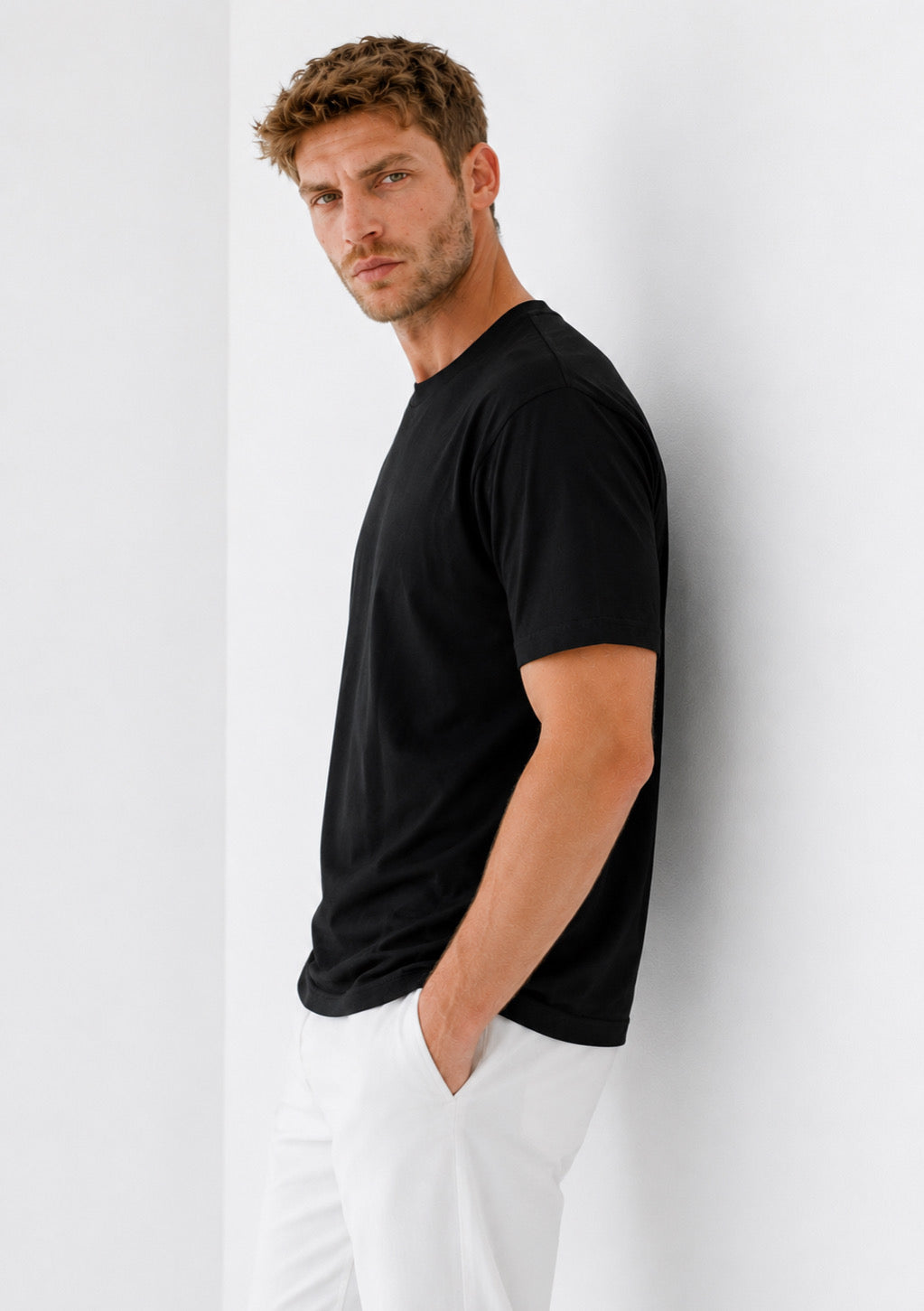 Montx men's black half sleeve round neck T-shirt with regular fit, casual style, displayed on a plain background.