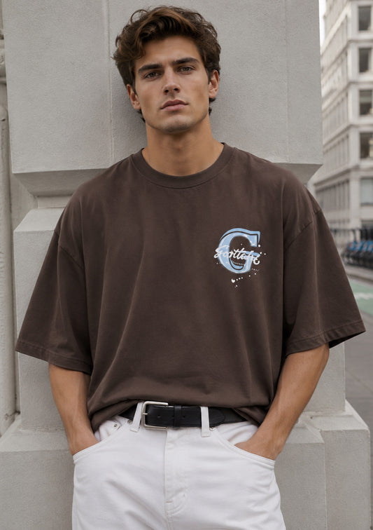 Montx men's loose fit Go Ahead print T-shirt in dark chocolate color, casual short-sleeve crewneck with graphic design.