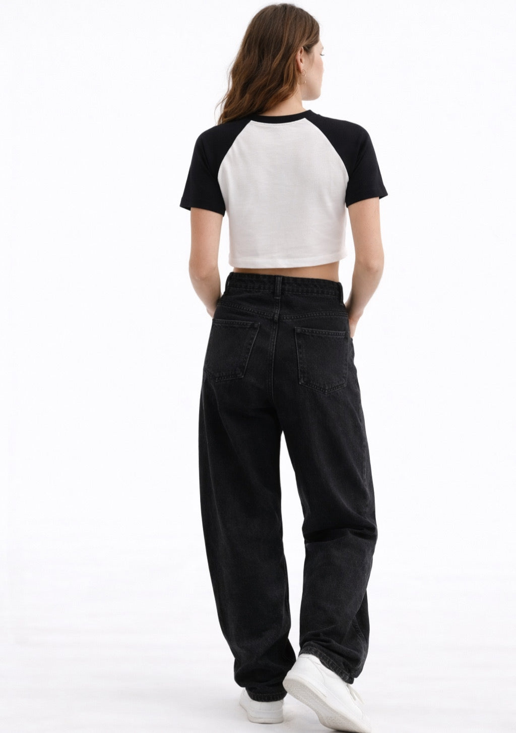 Montx Women’s black and white crop T-shirt with a stretch fit, casual style, shown on a model.