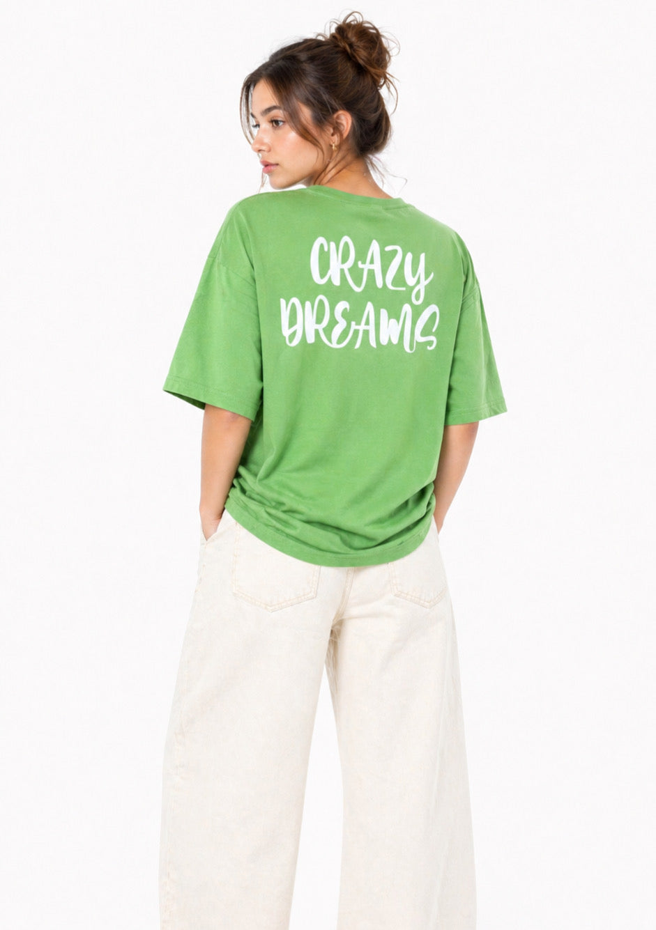 Montx Women’s green graphic oversized T-shirt with bold design, casual fit, and comfortable fabric, perfect for everyday wear.