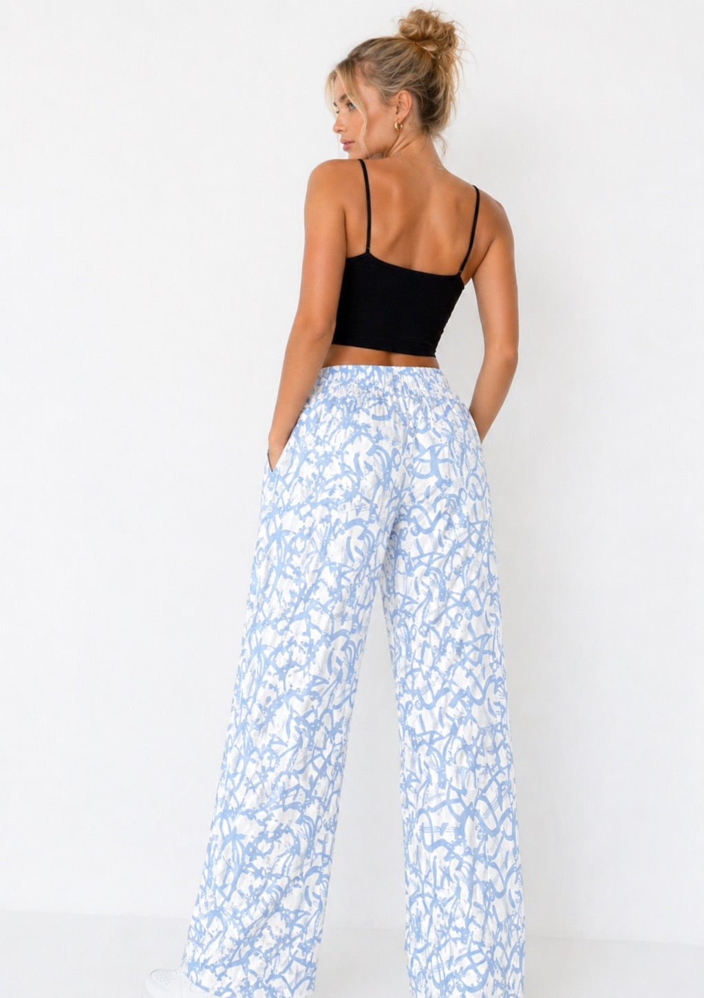 Montx women's sky blue abstract print wide leg joggers with relaxed fit, featuring comfortable, flowing fabric and stylish design.
