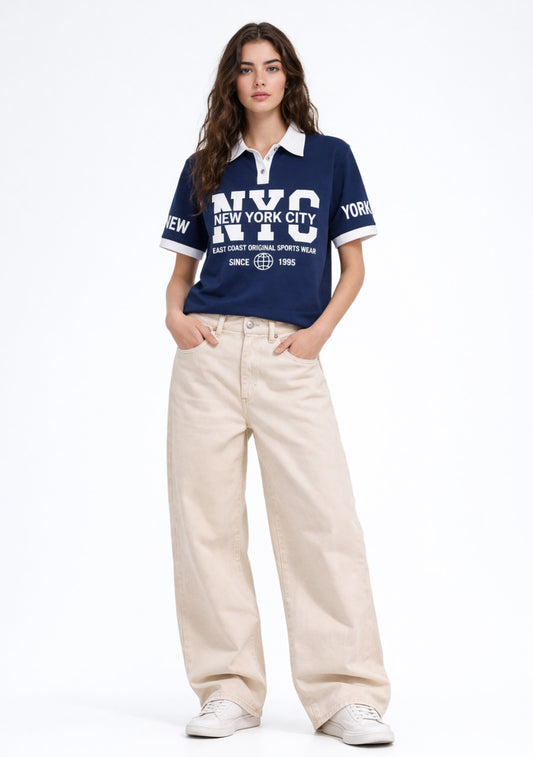 Montx Women’s NYC printed cotton polo T-shirt in navy blue, casual fit with city-themed graphic design.