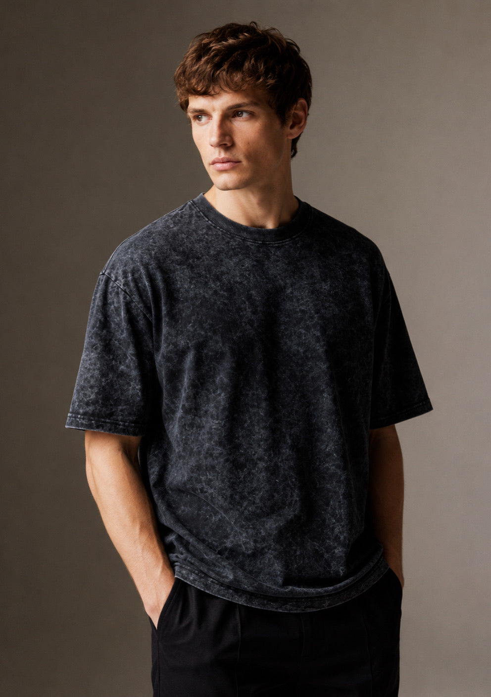 Montx oversized acid wash streetwear T-shirt in light blue with relaxed fit, featuring a worn, vintage-inspired look.
