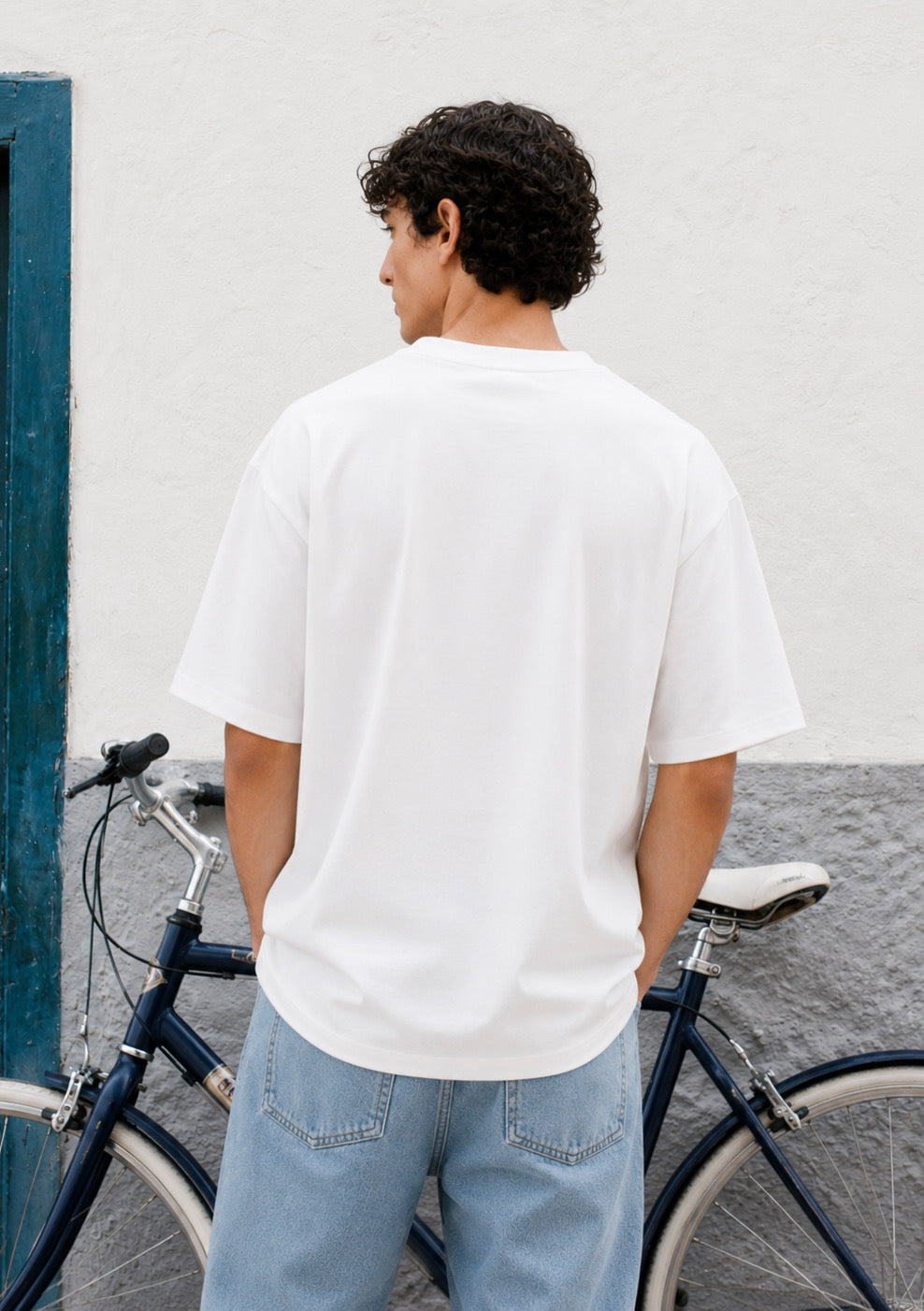 Montx Essential Boxy Fit T-Shirt for Men in white, featuring a simple, classic design and comfortable fit.