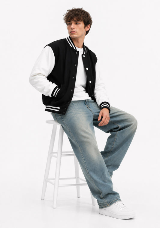 Montx Classic Varsity Jacket in black, featuring a stylish black and white design with ribbed cuffs and collar, front button closure.