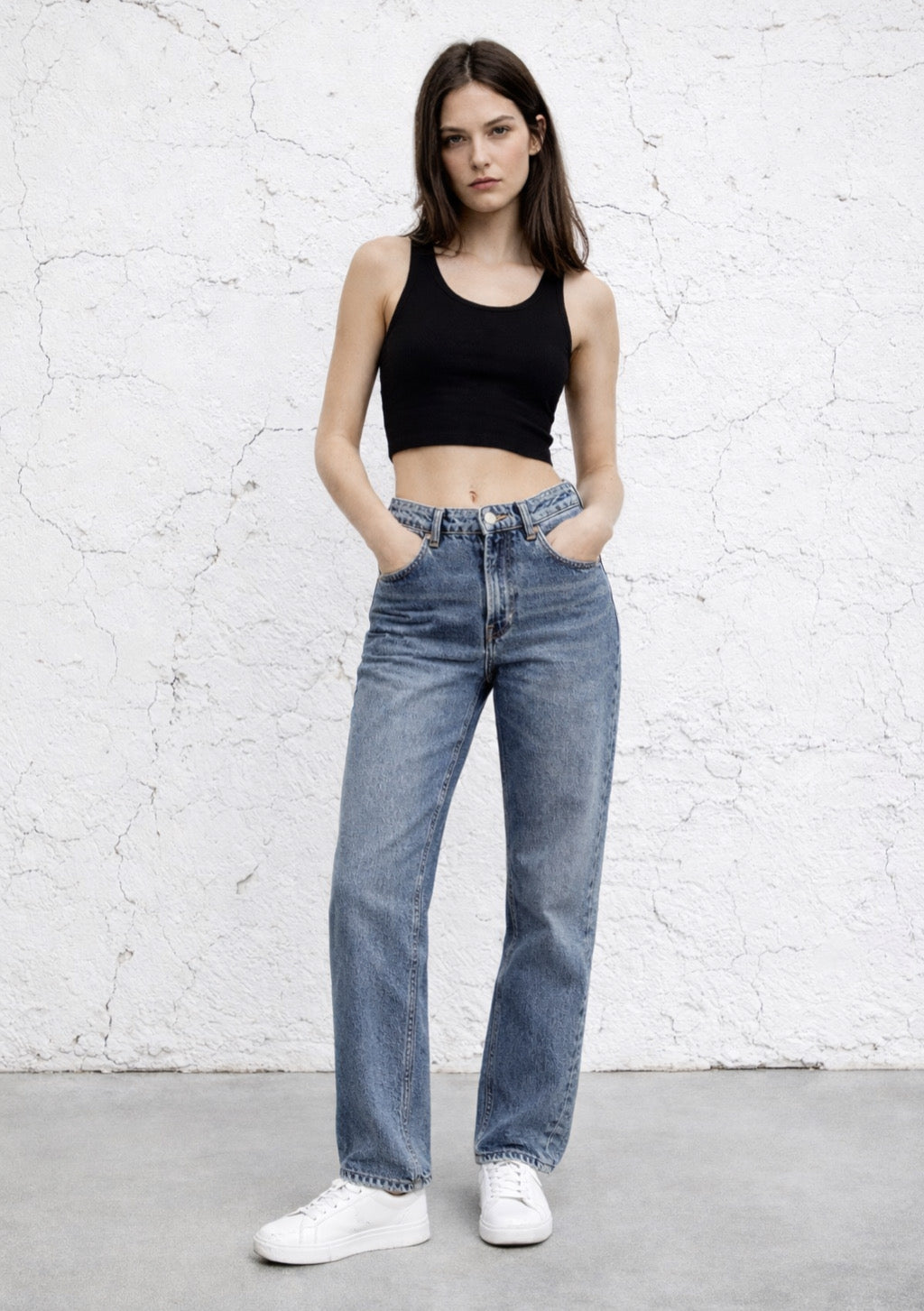 Montx Mid Wash Blue Denim Jeans in straight fit, displayed on a hanger with visible stitching and classic five-pocket design.