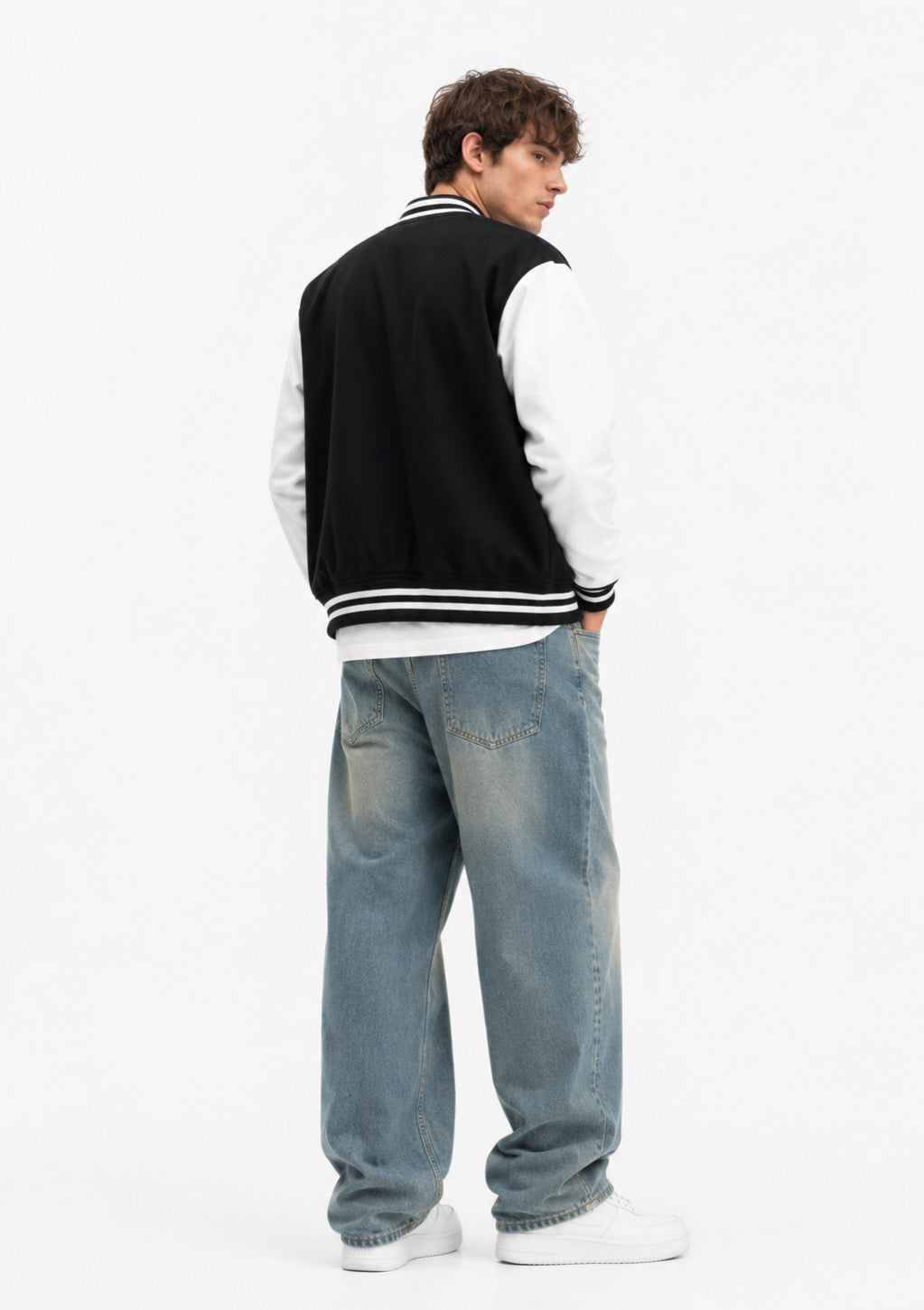 Montx Classic Varsity Jacket in black, featuring a stylish varsity design with contrasting sleeves and branding details.