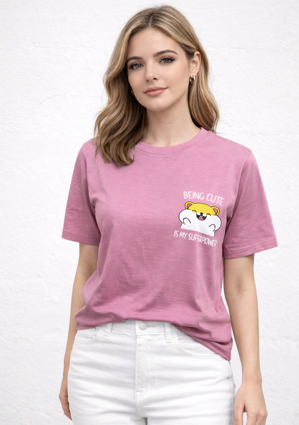 Montx women's pink printed T-shirt with a cute statement design, showcasing vibrant colors and casual style.