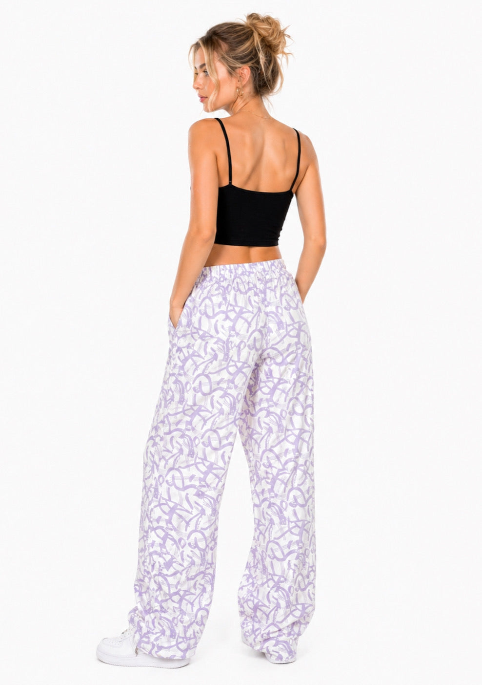 Women’s lavender abstract print wide leg joggers with relaxed fit, featuring soft fabric and stylish design from Montx The Clothing Brand.