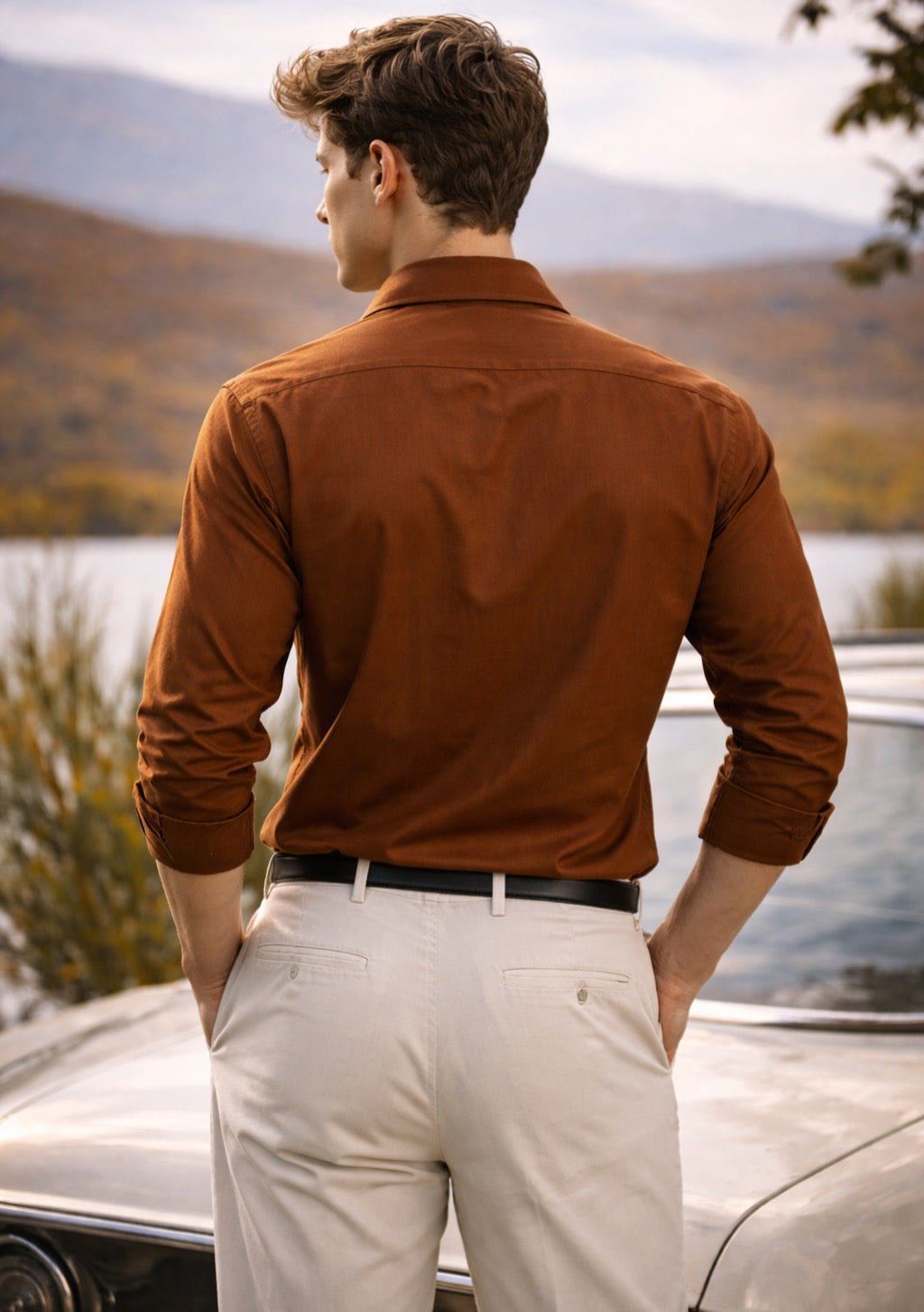 Montx men's copper brown full-sleeve cotton shirt displayed on a hanger, showcasing casual style and premium fabric.