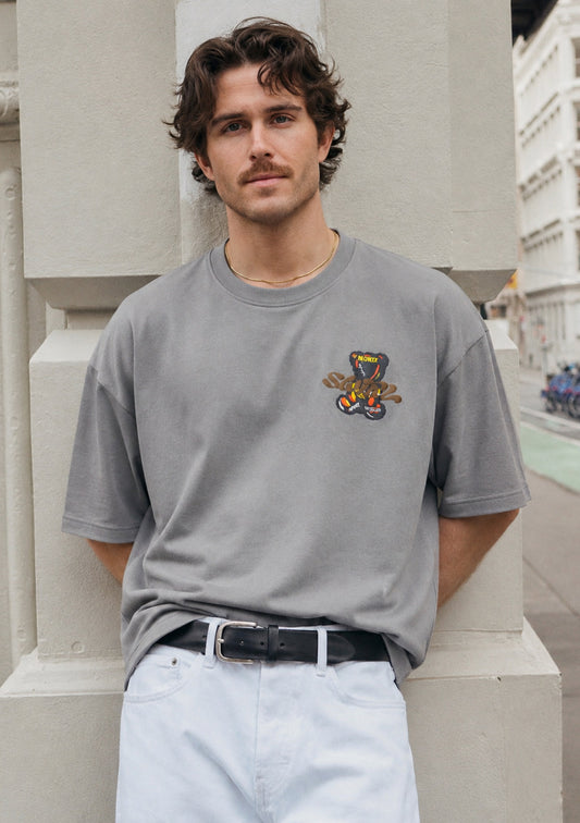 Montx men's grey polar bear design T-shirt with loose fit, street style, casual wear, featuring a bold polar bear graphic.