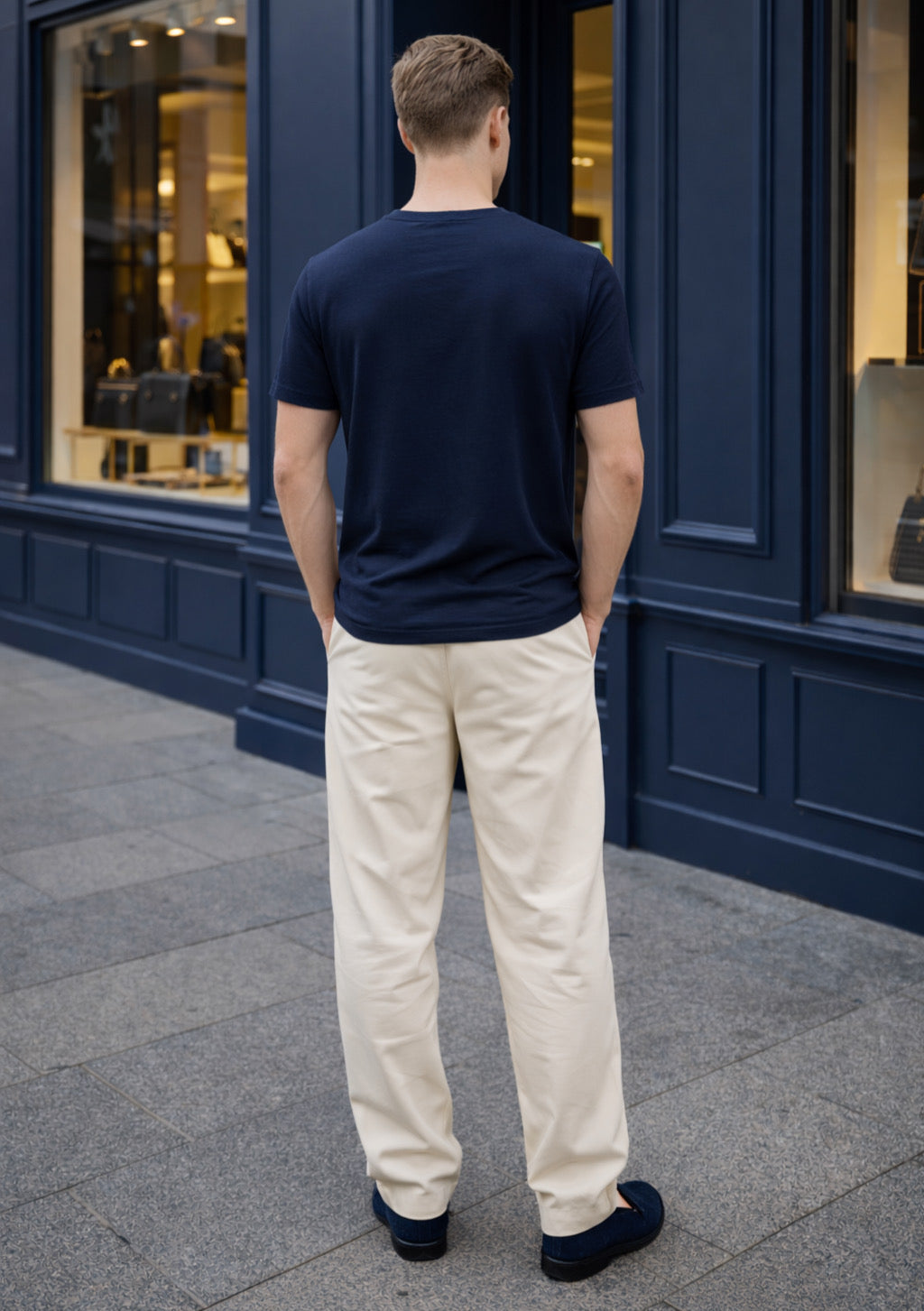 Navy blue Montx men's regular fit T-shirt displayed flat, showcasing the soft cotton fabric and classic crew neckline.