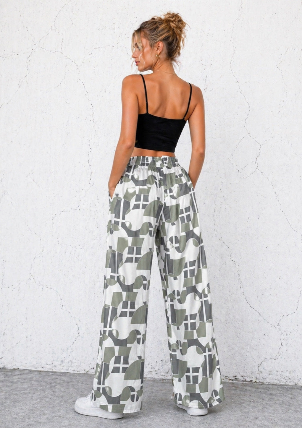 Women’s olive green abstract print wide leg joggers by Montx The Clothing Brand, featuring a relaxed fit and stylish design.