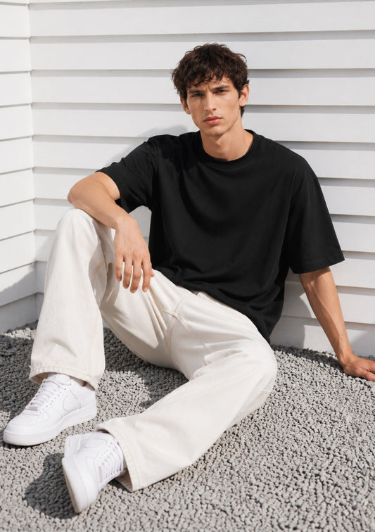 Black Montx Essential Boxy Fit T-Shirt for men, featuring a relaxed, oversized style made by Montx The Clothing Brand.