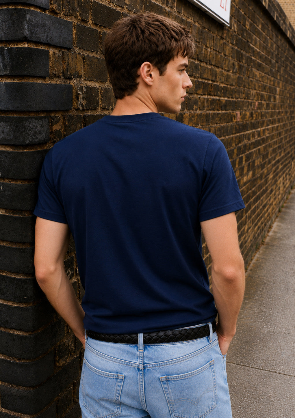 Montx men's navy blue regular fit round neck T-shirt displayed on a hanger, showcasing casual men's clothing.