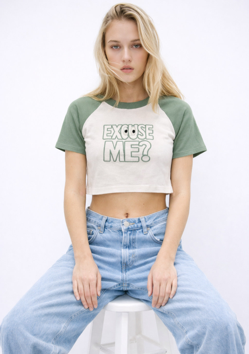 Montx women's crop T-shirt in sage green and white with a stretch fit, casual style, shown on a flat lay.